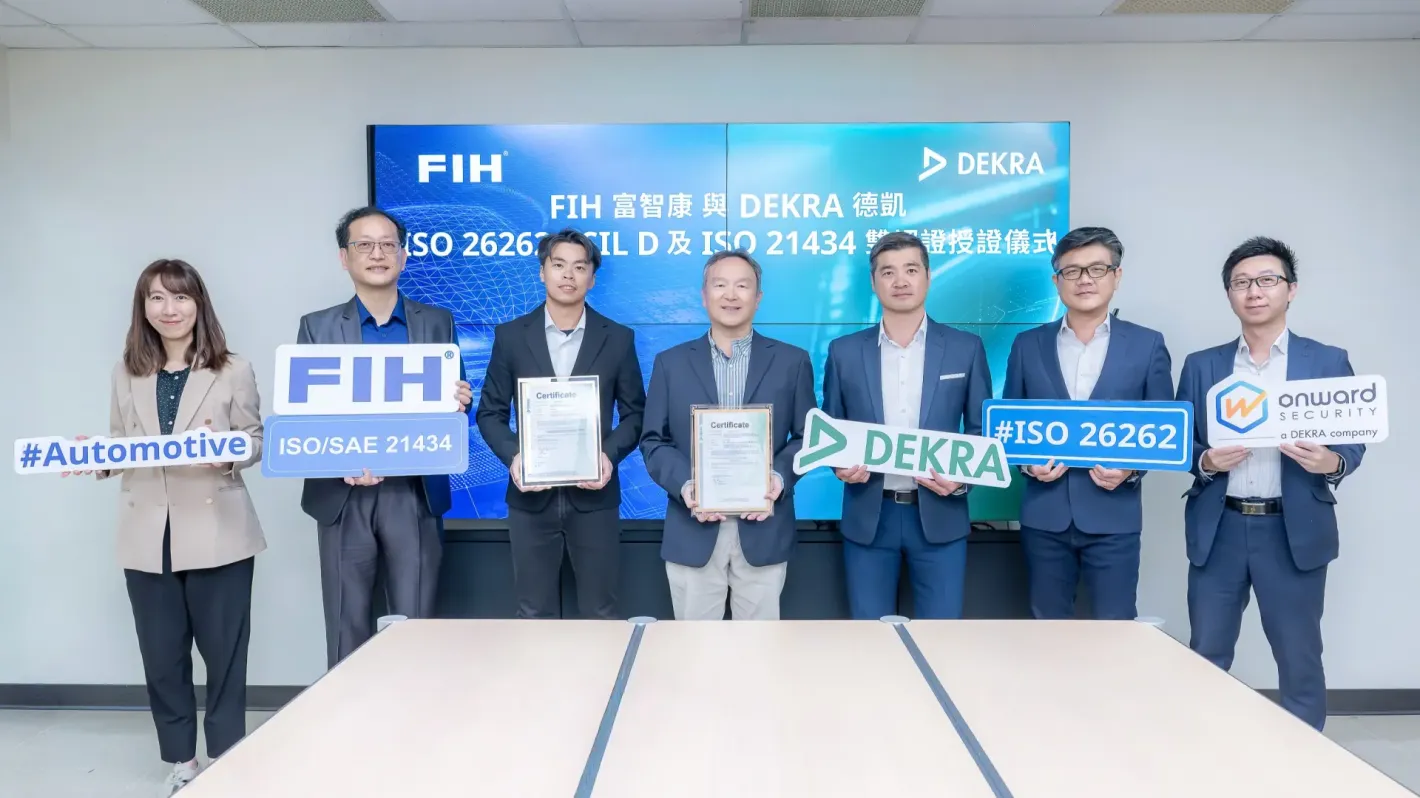 FIH’s Automotive Electronics Team team poses for a group photo with the expert team from DEKRA